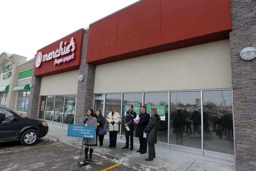 QUICKCARE CLINICS - Initiatives to help ensure all Manitobans have access to a family doctor by 2015 and location of a new QuickCare Clinic. In front of future clinic. Health Minister Erin Selby addresses the media. BORIS MINKEVICH / WINNIPEG FREE PRESS  March 11, 2014