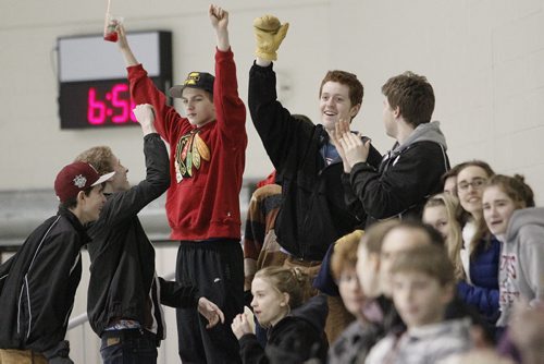 March 11, 2014 - 140311 -  Westwood Warriors' fans celebrate a goal against the Selkirk Royals in game 2 of the WWHSHL Division B final at MTS IcePlex Tuesday, March 11, 2014. Westwood Warriors tied the series 1-1.John Woods / Winnipeg Free Press