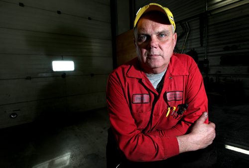 Phil Admiral poses in his Stonewall auto repair shop Thursday, see Bill Redekopp story re: the Plymouth Brethren, a cult-like Christian Sect  March 13, 2014 - (Phil Hossack / Winnipeg Free Press)