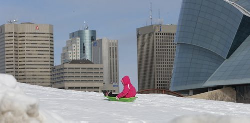 Stdup Chill'in Weather  - minus 14 Temps haven't kept kids from sliding at the Forks , Elizabeth Sharp age 6 sliding be it backwards on the crisp icy hill  - Mar. 14 2014 / KEN GIGLIOTTI / WINNIPEG FREE PRESS