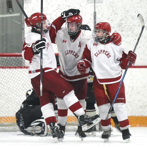 After scoring late in the game, Kelvin Clippers player Stephen McGregor in centre  celebrates his goal with team mates Noah Mendoza ( right ) and Riley Gilmore during their AAAA Provincial Tournament semi-final game at the Gateway Recreation Centre Friday against the Dauphin Clippers . The Kelvin Clippers  defeated the Dauphin Clippers 6-1.   Wayne Glowacki / Winnipeg Free Press March 14   2014