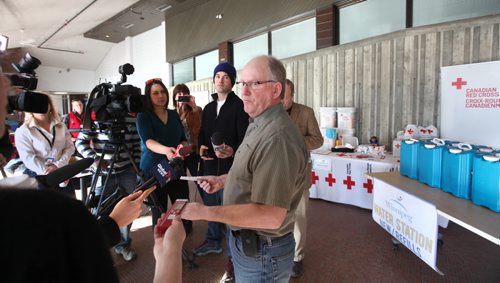 Emergency Preparedness Coordinator Randy Hull, describes the items available to the public experiencing frozen water pipes at the first resource centre set at the Cindy Klassen Rec Centre on Sargent Ave.   See Nick Martins Story.  March 15, 2014 Ruth Bonneville / Winnipeg Free Press