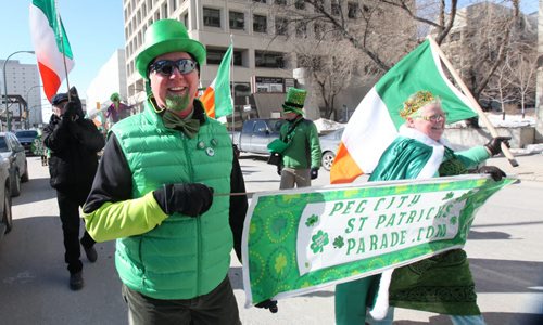 Bill snf Catriona Younger  are all smiles as she  they head up the St Patrick Day Parade Saturday down York Ave near Shannon's Irish Pub Saturday afternoon in celebration of St. Patrick's Day.  March 15, 2014  Ruth Bonneville / Winnipeg Free Press