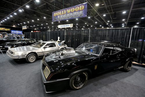A Delorean from the Back to the Future movie series alongside a Ford Falcon from the Mad Max series at the World of Wheels Car show at the Convention Centre, Saturday, March 15, 2014. (TREVOR HAGAN/WINNIPEG FREE PRESS)