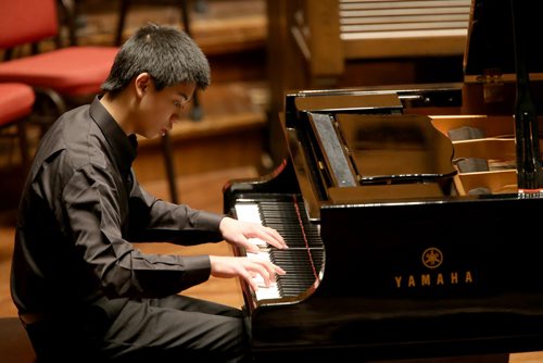 Albert Chen plays the piano during the Aikins Memorial Trophy part of the Winnipeg Music Festival at Westminster United Church, Saturday, March 15, 2014. (TREVOR HAGAN/WINNIPEG FREE PRESS)