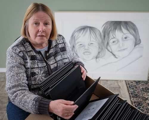 Artist Julia Penny started the year by creating one of her largest projects ever, portraits of the 47 victims of the Lac-Megantic train disaster. The artist from Winnipeg Beach was inspired to draw these people when she started a double portrait of the 2 youngest victims and then explored the stories of them all. Julia intends to donate the portraits to the Town and to the families affected. The pencil portraits will be in a show at The Cre8ery Gallery from March 20 - April 1.   140316 - Sunday, March 16, 2014 -  (MIKE DEAL / WINNIPEG FREE PRESS)