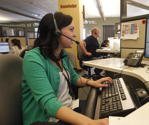Saturday Special. A few of the Winnipeg 311 customer service representatives at the call centre. (The operator in the foreground didn't want to give her name but was ok with photo.) Kevin Rollason story  Wayne Glowacki / Winnipeg Free Press March 17   2014