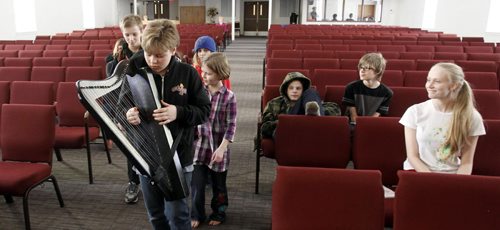 Home school students rehearse a scene from Shakespeare's Cymbeline they will be performing. Ben McIntyre-Ridd with harp with students rehearse in the  Central Church of Christ.  Home school story by Nick Martin Wayne Glowacki / Winnipeg Free Press March 18   2014