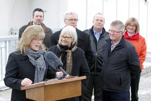 Canadian Heritage and Official Languages Minister Shelly Glover addresses the media at the Floodway inlet control structure.  Completion of the Red River Floodway expansion project came in under budget. BORIS MINKEVICH / WINNIPEG FREE PRESS  March 18, 2014