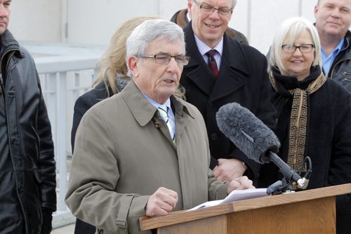 Ernie Gilroy, CEO, Manitoba Floodway Authority addresses the media at the Floodway inlet control structure.  Completion of the Red River Floodway expansion project came in under budget. BORIS MINKEVICH / WINNIPEG FREE PRESS  March 18, 2014