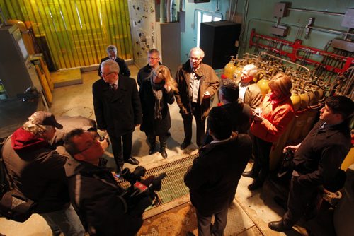 Premier Greg Selinger (middle left), with MP Shelly Glover (middle right) tours the inside of the Red River Floodway facilities Tuesday. Completion of the Red River Floodway expansion project came in under budget. BORIS MINKEVICH / WINNIPEG FREE PRESS  March 18, 2014