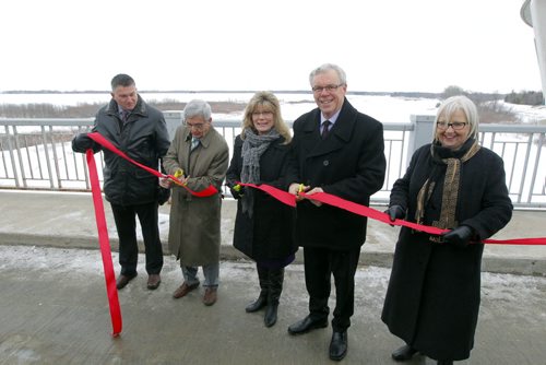 LtoR- Selkirk-Interlake MP James Bezan, Ernie Gilroy, CEO, Manitoba Floodway Authority, Canadian Heritage and Official Languages Minister Shelly Glover, Premier Greg Selinger, and Joy Smith, MP for Kildonan-St. Paul -  Completion of the Red River Floodway expansion project came in under budget. BORIS MINKEVICH / WINNIPEG FREE PRESS  March 18, 2014