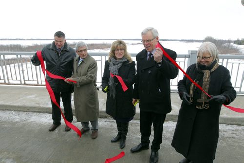 LtoR- Selkirk-Interlake MP James Bezan, Ernie Gilroy, CEO, Manitoba Floodway Authority, Canadian Heritage and Official Languages Minister Shelly Glover, Premier Greg Selinger, and Joy Smith, MP for Kildonan-St. Paul -  Completion of the Red River Floodway expansion project came in under budget. BORIS MINKEVICH / WINNIPEG FREE PRESS  March 18, 2014