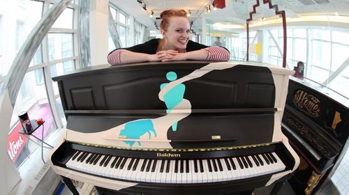 The Piano Project Chloe Chafe  a Visual Artist at Studio 393. located int the overhead walkway between The Bay and Portage Place,  displays her Juno Themed piano she painted which will be one of the 7 pianos placed in a public space in downtown Winnipeg to be used and enjoyed at will by Winnipegers. See Story. March 18, 2014 Ruth Bonneville / Winnipeg Free Press