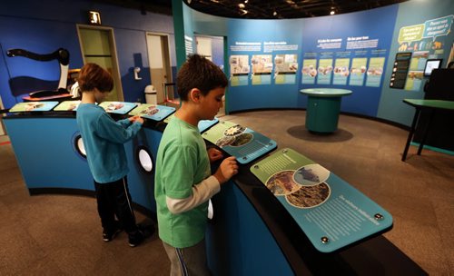 LtoR ,Jacob Block age 8 and Dhruv Joshi age 9 get look at the exhibit ,Lake Winnipeg Shared Solutions Exhibit opens March 22  at the Manitoba Museum with the  aim to educate  the public about is threatened body of water and how to  fix the lake Mar. 19 2014 / KEN GIGLIOTTI / WINNIPEG FREE PRESS