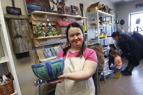 Finance. Karen Lehr holds a bowl she made for DASCH's The Scrap Came Back Upcycle Gift Store on St. Anne's Rd. The official opening was Wednesday.  Murray McNeill story Wayne Glowacki / Winnipeg Free Press March 19   2014