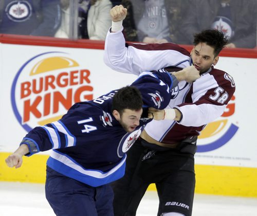 NHL Hockey Winnipeg Jets vs. Colorodo Avalanche at MTS Centre Second Period. Winnipeg Jets #14 Anthony Peluso battled Avalanche #58 Patrick Bordeleau. Fight. BORIS MINKEVICH / WINNIPEG FREE PRESS  March 19, 2014