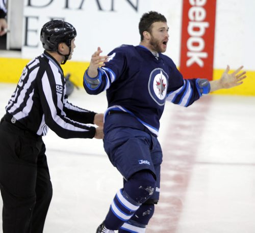NHL Hockey Winnipeg Jets vs. Colorodo Avalanche at MTS Centre Second Period. Winnipeg Jets #14 Anthony Peluso battled Avalanche #58 Patrick Bordeleau. Fight. BORIS MINKEVICH / WINNIPEG FREE PRESS  March 19, 2014