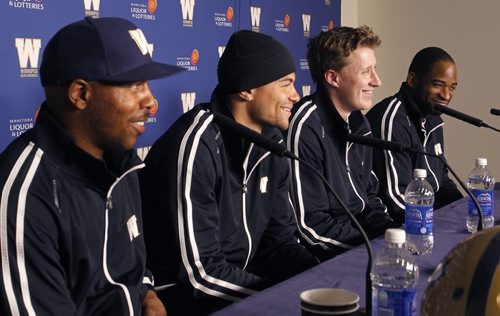 Winnipeg Blue Bombers players from left,  defensive back Korey Banks,  wide receiver  Nick Moore, quarterback Drew Willy and wide receiver Cory Watson at press conference at Investors  Group Field Thursday.   Melissa Martin  story.    Wayne Glowacki / Winnipeg Free Press March 20   2014