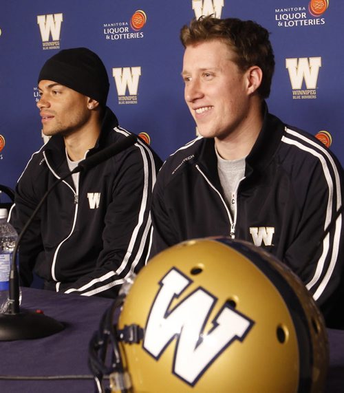 Winnipeg Blue Bombers players from right, quarterback Drew Willy and  wide receiver Nick Moore at press conference at Investors  Group Field Thursday.   Melissa Martin  story.    Wayne Glowacki / Winnipeg Free Press March 20   2014