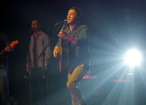 Phillip Phillips belts it out during his performance in Winnipeg at the Burton Cummings Theatre. BORIS MINKEVICH / WINNIPEG FREE PRESS  March 20, 2014