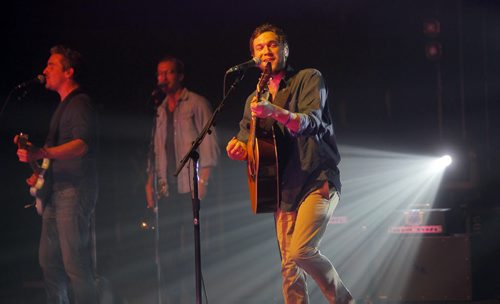 Phillip Phillips belts it out during his performance in Winnipeg at the Burton Cummings Theatre. BORIS MINKEVICH / WINNIPEG FREE PRESS  March 20, 2014