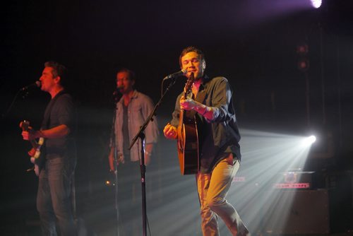 Phillip Phillips belts it out during his performance in Winnipeg at the Burton Cummings Theatre. BORIS MINKEVICH / WINNIPEG FREE PRESS  March 20, 2014