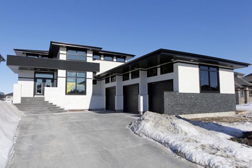 NEW HOMES - 129 Autumview Drive in Waverly West. BORIS MINKEVICH / WINNIPEG FREE PRESS  March 21, 2014