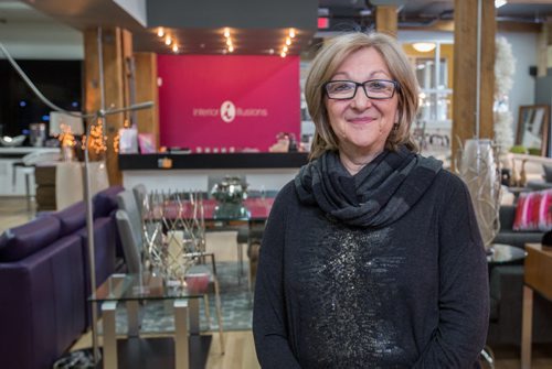 Magda Zelickson, co-owner of Interior Illusions, poses in the stores new Princess St. location in Winnipeg on Friday, March 21, 2014. The business has seen an increase in sales since the relocation. (Photo by Crystal Schick/Winnipeg Free Press)