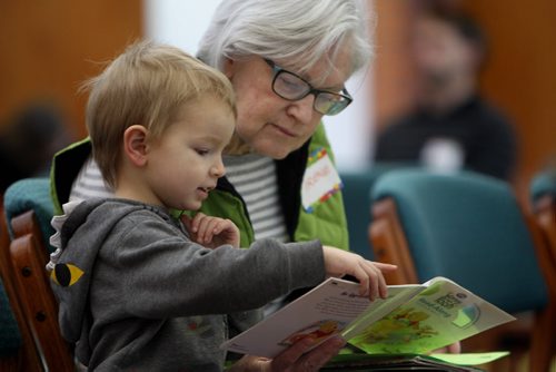 Four year old Vito Meyer-Read reads with volunteer lawyer  Irene Hamilton  at West Broadway Youth Outreach during the Lawyers Helping Kids Read Literacy event Saturday.  March 22, 2014 Ruth Bonneville / Winnipeg Free Press