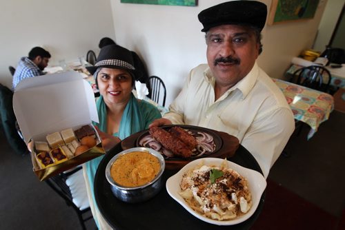 Sunita Nagpal, left and her husband Avnish in their restaurant Sizzling Dhaba 628A St Annes Road-  with selection of food and bakery available-    See Marions Warhaft review  Mar 24, 2014   (JOE BRYKSA / WINNIPEG FREE PRESS)