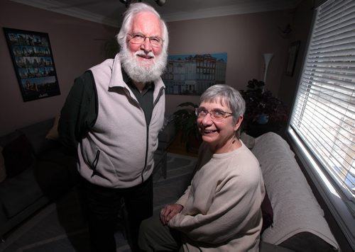 Barry Hammond and his wife Mary pose in their home, they have written a story about why they chose to live in Point Douglas for the past 30 years. (He is a retired U of M prof.) See story. March 24, 2014 - (Phil Hossack / Winnipeg Free Press)