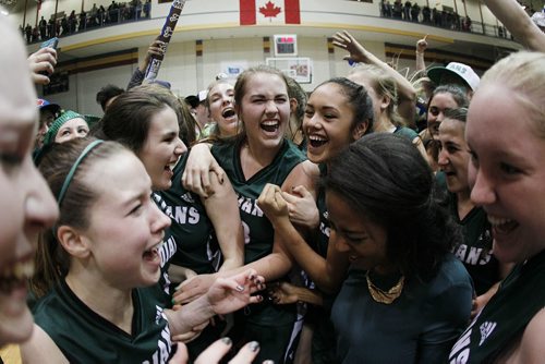 March 24, 2014 - 1401  -  Vincent Massey Trojans celebrate a win over the Sisler Spartans in the MHSAA AAAA Provisional Basketball Championships at the University of Manitoba Monday, March 24, 2014. John Woods / Winnipeg Free Press