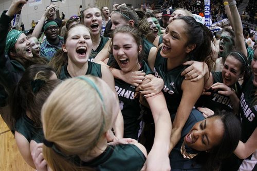 March 24, 2014 - 1401  -  Vincent Massey Trojans celebrate a win over the Sisler Spartans in the MHSAA AAAA Provisional Basketball Championships at the University of Manitoba Monday, March 24, 2014. John Woods / Winnipeg Free Press