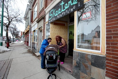 The Boldness Project - 49.8 section  Wendy Hallgrimson,visits her hair dresser -- Skeeter Paul on  Selkirk Ave. with her  2 month old baby boy Lindal after doing business in the area.  Wendy and her partner James have lived in the area all their lives want their son to grow up healthy and proud of his roots. See story. March 20, 2014 Ruth Bonneville / Winnipeg Free Press