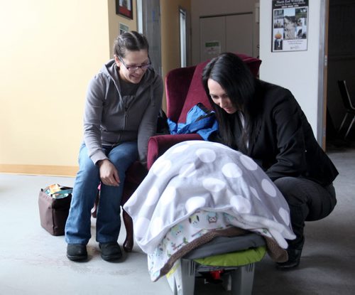 The Boldness Project - 49.8 section  Wendy Hallgrimson visits  with Diane Roussin with the Boldness project on Selkirk Ave. with her 2 month old baby boy Lindal Zebrasky.  Her family is part of a new initiative to change the stats on literacy and health in First Nations children living in the North End.  See story. March 20, 2014 Ruth Bonneville / Winnipeg Free Press