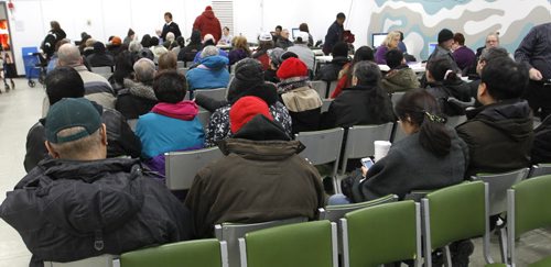Dozens of people  in the auditorium in the Norquay Building with all their receipts for the free tax services  thats meant to help poor people get their tax refunds. Mary Agnes Welch story  Wayne Glowacki / Winnipeg Free Press March 25   2014