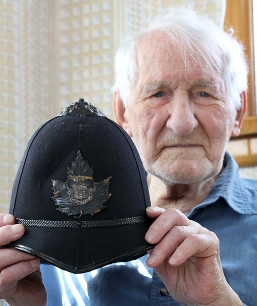 Oldest living Winnipeg police officer, soon-to-to-be 99-year-old Ken Hansell with his original police helmet.- See Gordon Sinclair story- Mar 25, 2014   (JOE BRYKSA / WINNIPEG FREE PRESS)