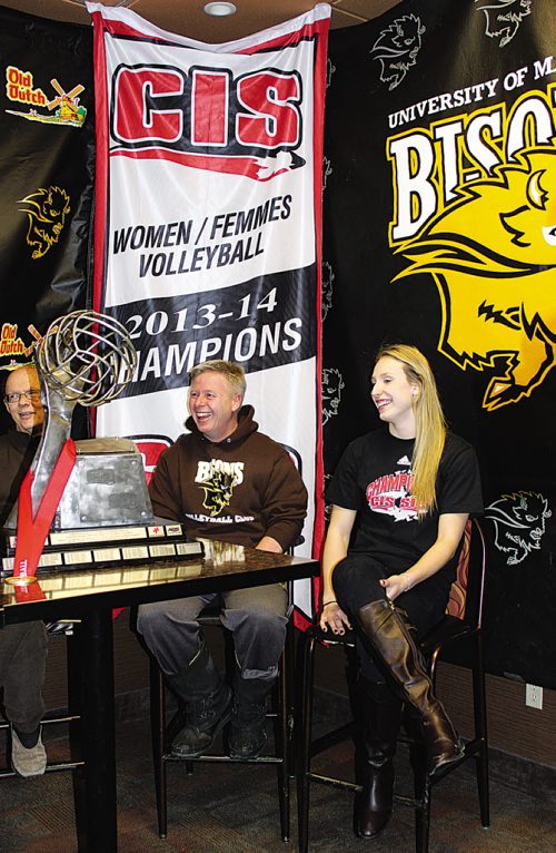 Canstar Community News (05/03/2014)- Ken Bentley (middle) and Rachel Cockrell (right) of the U of M Bisons Women's Volleyball team talk about the CIS finals and defeating the top-seated UBC. The team won the CIS championships. Cockrell, right-side hitter, was tournament MVP. Bentley is head coach(STEPHCROSIER/CANSTARNEWS)