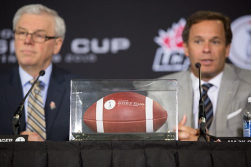 The Hon. Greg Selinger, left, Premier of Manitoba, and Mark Cohon, commissioner Canadian Football League, at a conference announcing the 2015 Winnipeg Grey Cup hosting at Investors Group Field in Winnipeg on Wednesday, March 26, 2014. (Photo by Crystal Schick/Winnipeg Free Press)