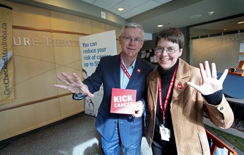 CanerCare Manitoba VP of marketing Bob Jones and Provincial Director of Population Oncology Dr. Donna Turner push the point that there are 5 things you can do to reduce your risk of getting cancer by 50%  at - Kick it launch at CancerCare Wednesday.  March 26, 2014 Ruth Bonneville / Winnipeg Free Press