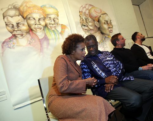 Michaelle Jean and Dr. Denis Mukwege from Congos Panzi Hospitalat the Grafitti Gallery Wednesday evening. The "Peace Art Show" an art show exploring not only the resiliency of the people of the DRC, but also the similarities youth from around the world all share. In the Eastern Democratic Republic of Congo (DRC), repeated cycles of conflict have contributed to its unfortunate notoriety of being branded as the worst place in the world to be a woman.. See Carol Sanders story March 26, 2014 - (Phil Hossack / Winnipeg Free Press)