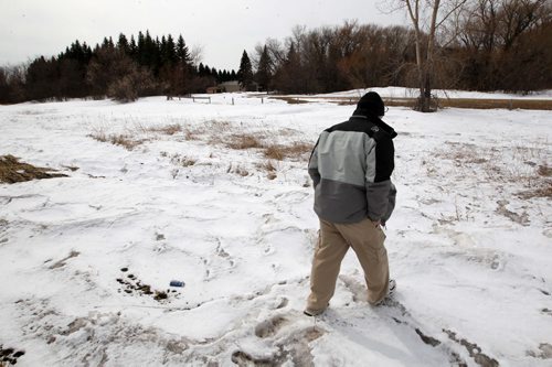 Free Press writer Randy Turner checks out the snow pack just inside the USA Canada border - See Randy Turner find spring story- March 26, 2014   (JOE BRYKSA / WINNIPEG FREE PRESS)