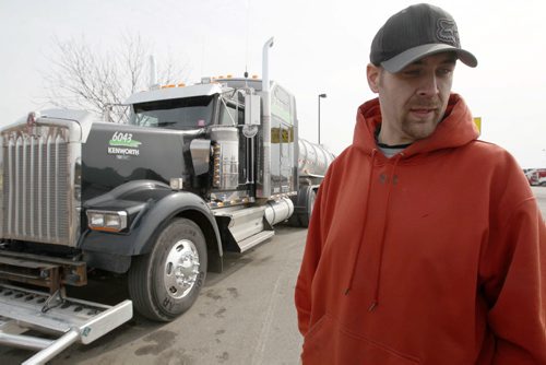 Bemidji, Minnesota trucker Allen Foster at Fargo, North Dakota - See Randy Turner find spring story- March 26, 2014   (JOE BRYKSA / WINNIPEG FREE PRESS)