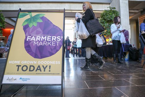 The Winnipeg Farmers Market gives a Winnipeggers a taste of spring with its one-day market, 10 a.m., to 4 p.m., at Manitoba Hydro Place Plaza in Winnipeg on Thursday, March 27, 2014. The full farmers market will run from June 5 to Oct. 2014., also at Manitoba Hydro Place Plaza. (Photo by Crystal Schick/Winnipeg Free Press)