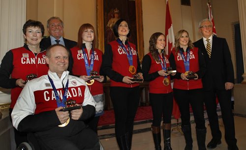 At a ceremony in the Manitoba Legislative building Thursday, Manitoban gold medal curlers from front left Dennis Thiessen (Paralympics) and members of Team Jones (Olympics)  Janet Arnott (coach), Dawn McEwen, Jill Officer, Kaitlyn Lawes and Jennifer Jones   were awarded the Order of The Buffalo Hunt by Premier Greg Selinger. In back is  Ron Lemieux, Minister of Tourism, Culture, Heritage, Sports and Consumer Protection.   Team Jones alternate  Kirsten Wall not present will also receive the Order of The Buffalo Hunt.  Wayne Glowacki / Winnipeg Free Press March 27   2014