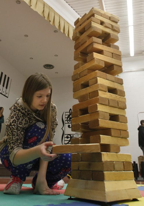 49.8 Intersection In photo,  Lord Selkirk School grade 5 student Isabella Mandarino plays Big Block.   For story on Sean Strachan,  the founder of Big Games, an enterprise that builds big games. Dave Sanderson story.   Wayne Glowacki / Winnipeg Free Press March 28   2014