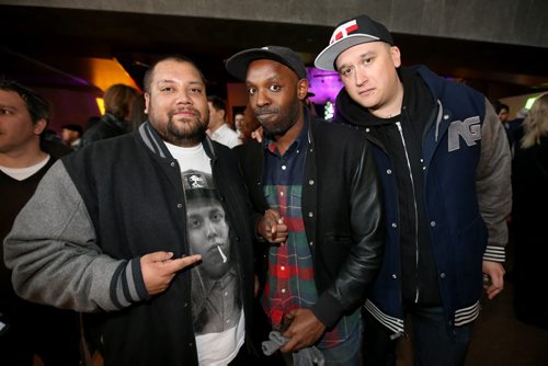Members of A Tribe Called Red, left and right, with Shad, middle in the crowd at the Juno Reception inside the Canadian Museum for Human Rights. Both are nominated for Juno's, Friday, March 28, 2014. (TREVOR HAGAN/WINNIPEG FREE PRESS)
