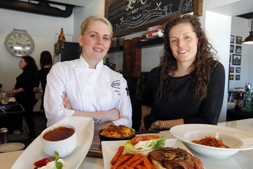 Marion Street Eatery .Chef Melissa Hryb and rest manager Laneil Smith pose for a photo in the restaurant. BORIS MINKEVICH / WINNIPEG FREE PRESS  March 28, 2014