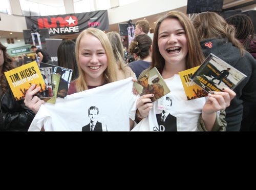 Seventeen year old Richelle Peters (left) and her friend Shianne Johnson - sixteen, waited patiently near the front of the stage at centre court  for 3 hours  Saturday with their CD's and shirts waiting for their favourite country artists to hit the stage at St. Vital Centre Saturday.   March 29, 2014 Ruth Bonneville / Winnipeg Free Press